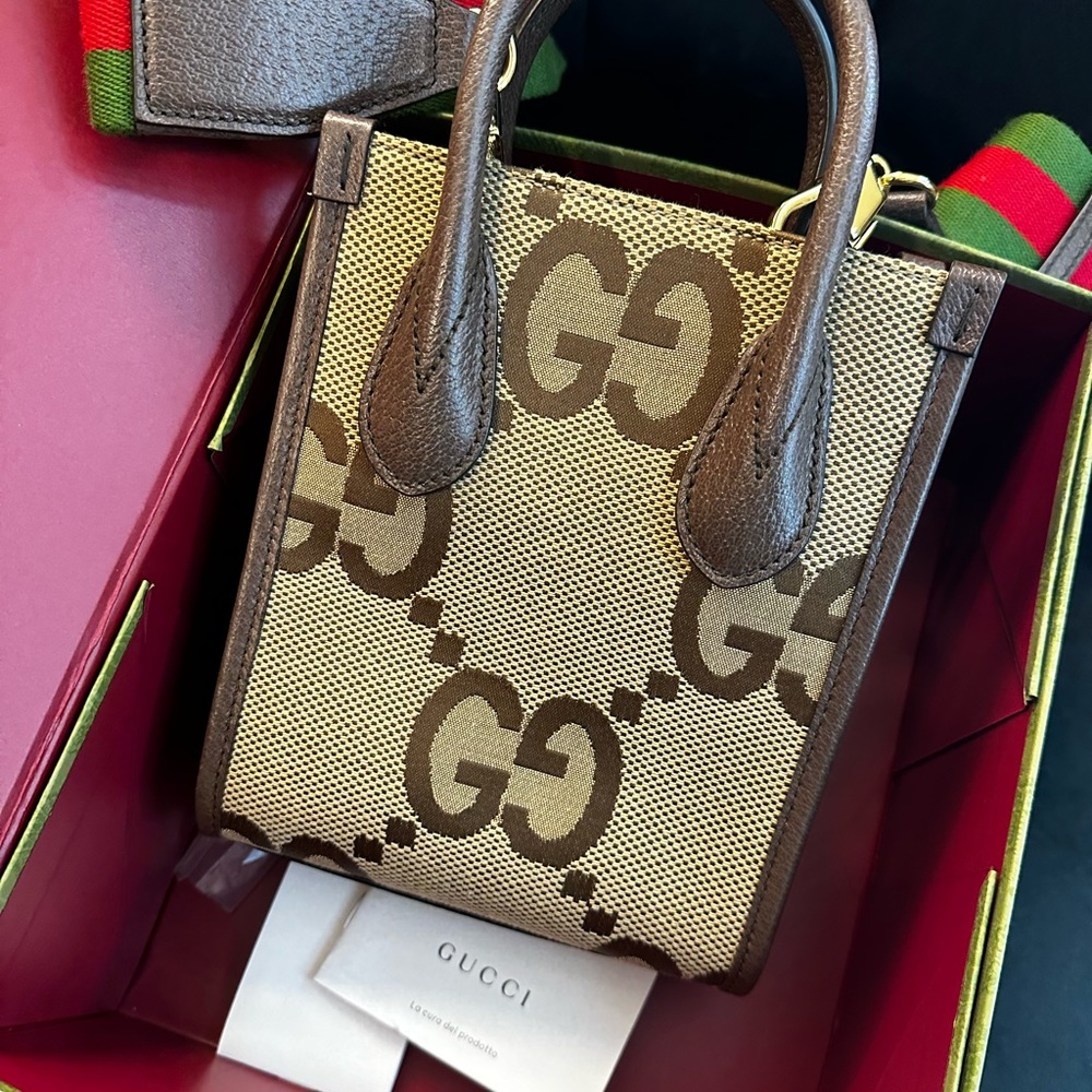 Gucci: JUMBO GG MINI TOTE BAG